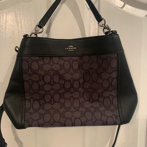 Black handbag with leather sides and 2 straps